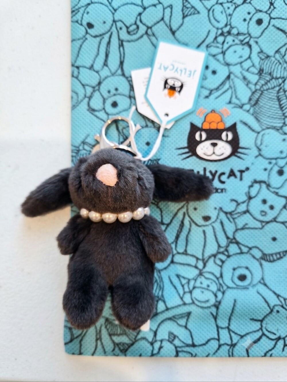 Jellycat Charcoal Bunny Bag Charm with Pearl Necklace